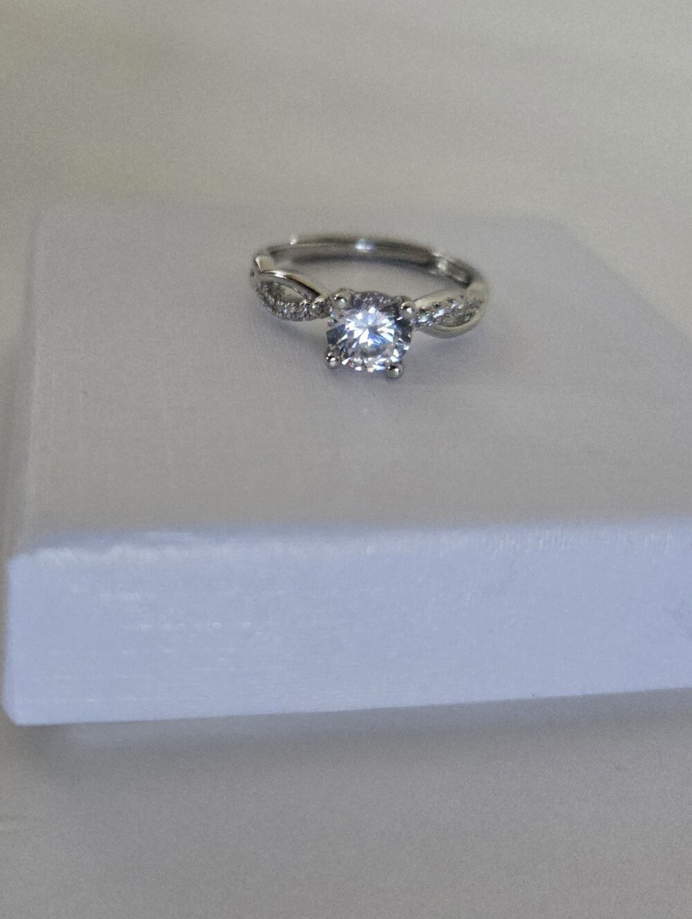 Classic Silver Solitaire Engagement Ring with Twisted Band